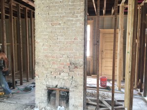 Here's a fireplace in the front of the house with the stucco removed. 